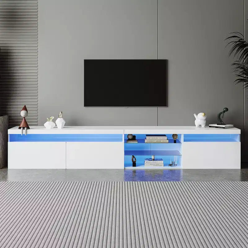 Meuble TV moderne avec lumières LED et rangements.