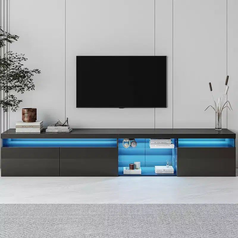 Meuble TV moderne avec lumières LED et rangements.