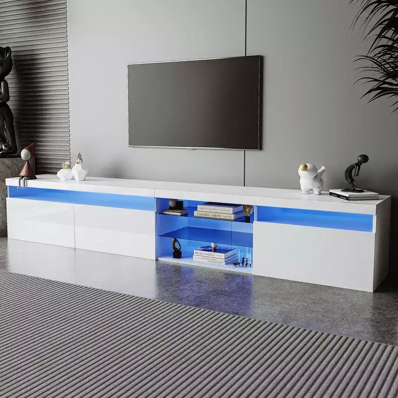 Meuble TV moderne avec lumières LED et rangements.
