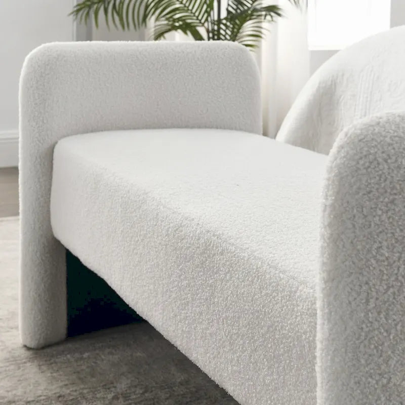 Banc capitonné en polyester avec piètement en H, design moderne et polyvalent.