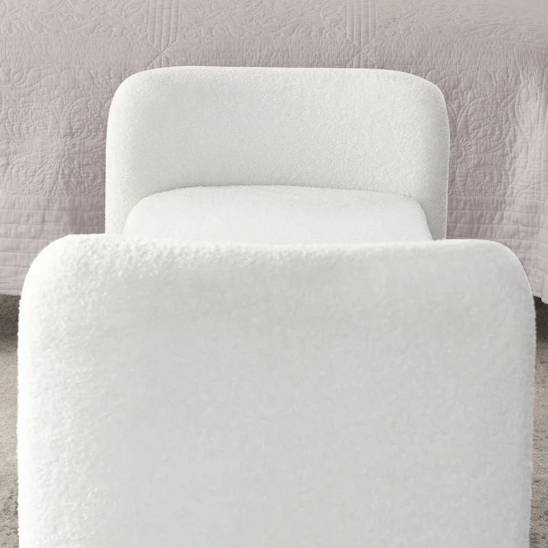 Banc capitonné en polyester avec piètement en H, design moderne et polyvalent.