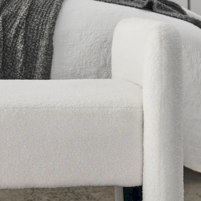 Banc capitonné en polyester avec piètement en H, design moderne et polyvalent.