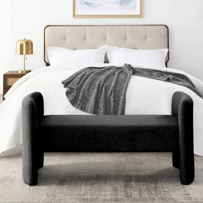 Banc capitonné en polyester avec piètement en H, design moderne et polyvalent.