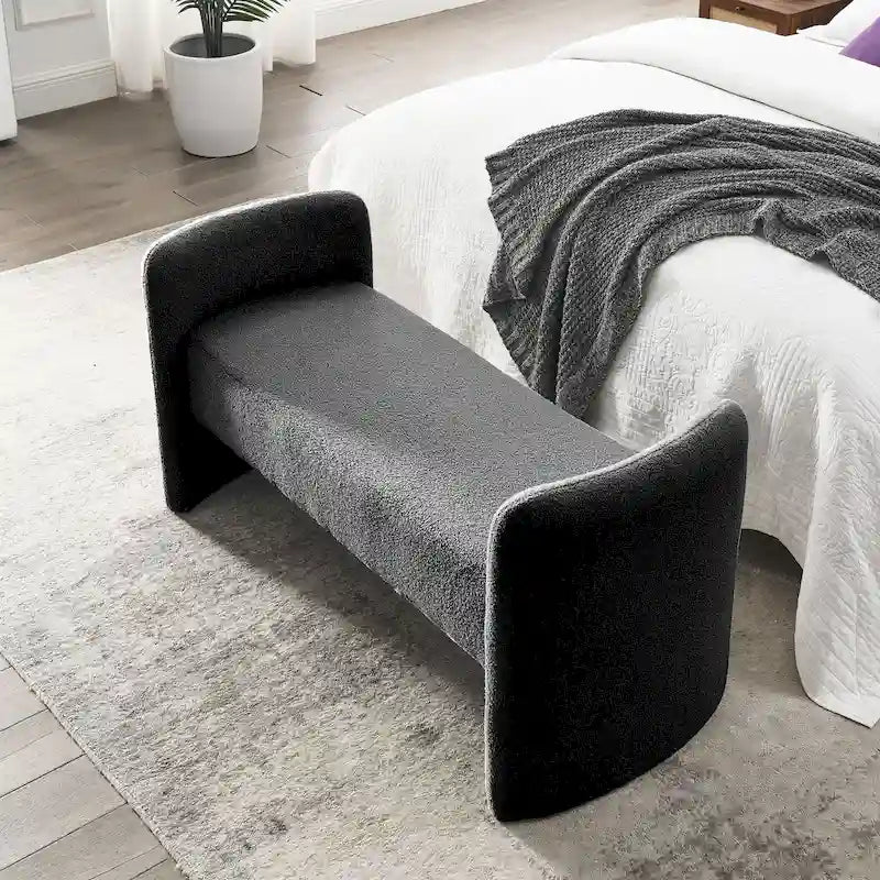 Banc capitonné en polyester avec piètement en H, design moderne et polyvalent.